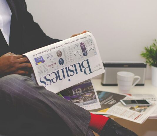 The hand rail is going a little faster than the moving sidewalk.
